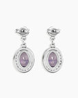Alexandrite earrings with visible colour shift from blue to purple – lab-grown oval-cut gemstones