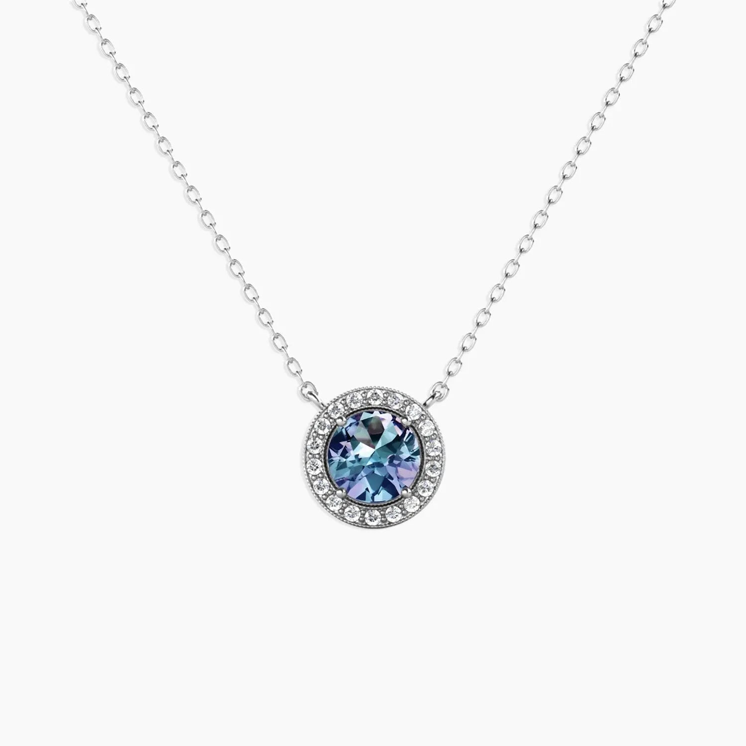Round halo pendant necklace with colour-changing Alexandrite in sterling silver – June birthstone