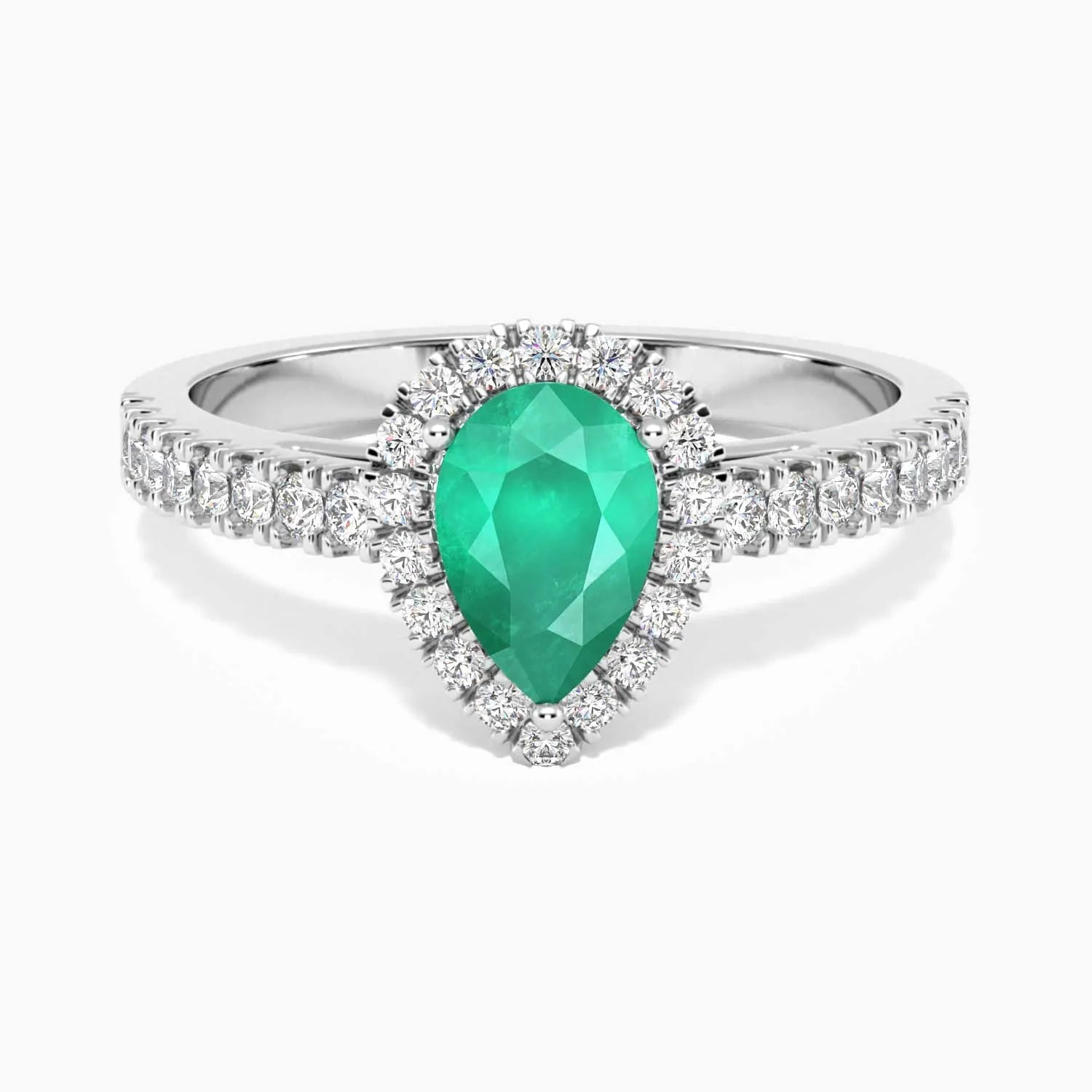 Sterling silver pear-cut emerald halo ring with a natural Sakota emerald center stone, framed by sparkling CZ.