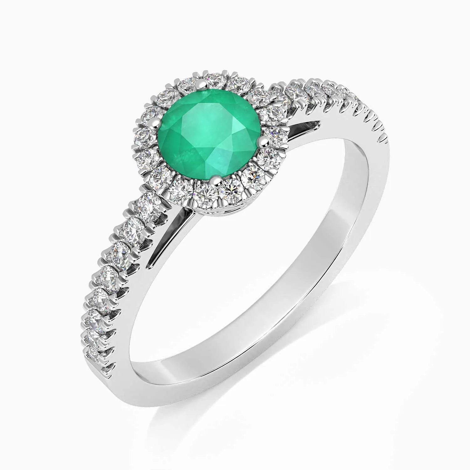 Angled view of the round-cut emerald halo ring in rhodium-plated sterling silver, highlighting the 5 mm gemstone.