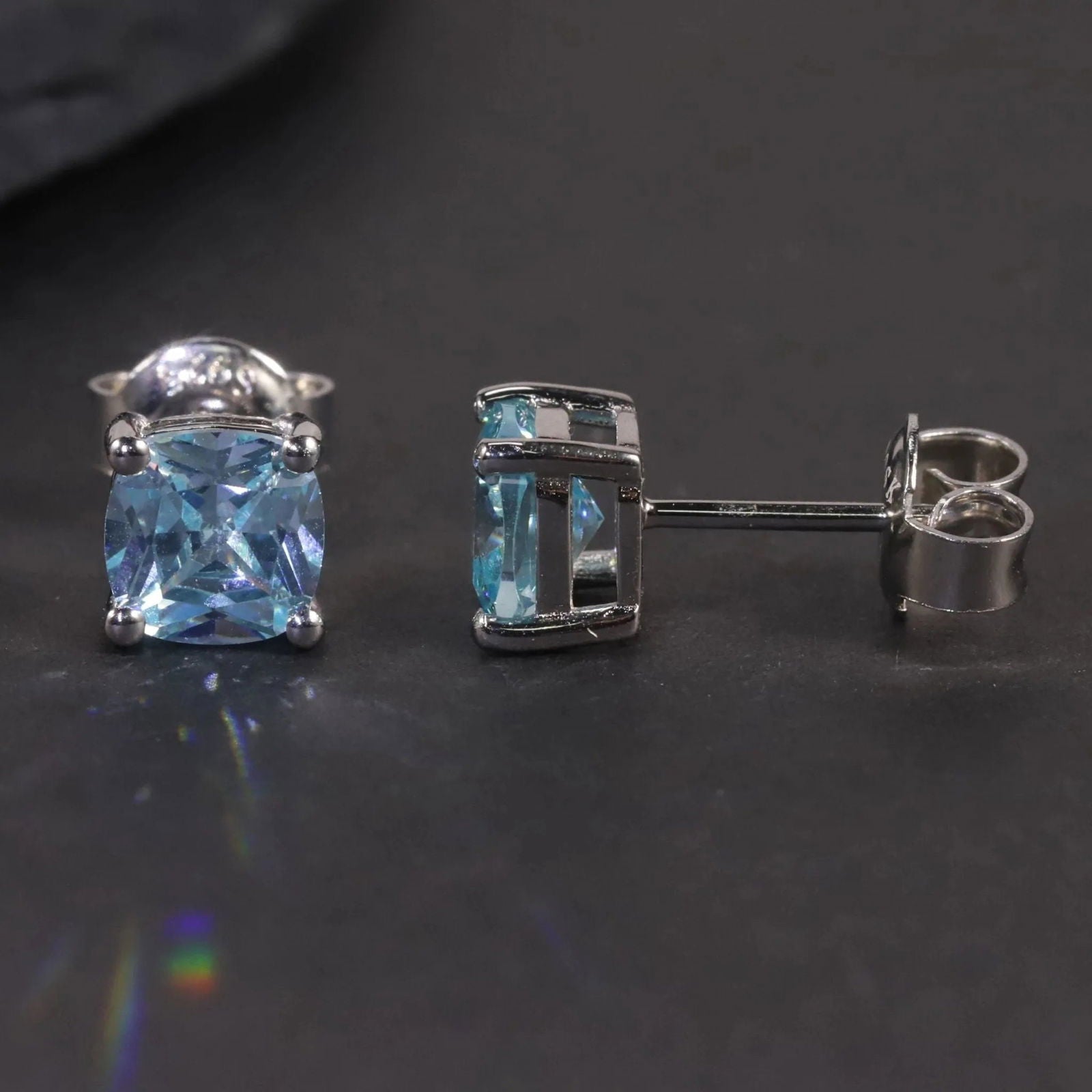 Swiss Blue Topaz Earrings - Cushion Cut Design - Side View