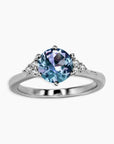 Trilogy ring in sterling silver with round-cut Alexandrite and CZ accents – elegant June birthstone ring