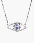 Necklace with eye-shaped pendant featuring a blue gemstone on a white background