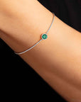 emerald bracelet on model wrist