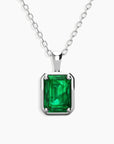 Sterling silver chain featuring a rectangular emerald-cut, lab-created emerald pendant with a vibrant green hue.