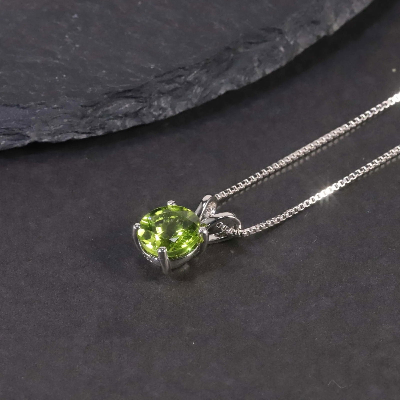 Close-up of Round Cut Peridot Necklace in Sterling Silver – Minimalist Design