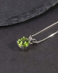 Close-up of Round Cut Peridot Necklace in Sterling Silver – Minimalist Design