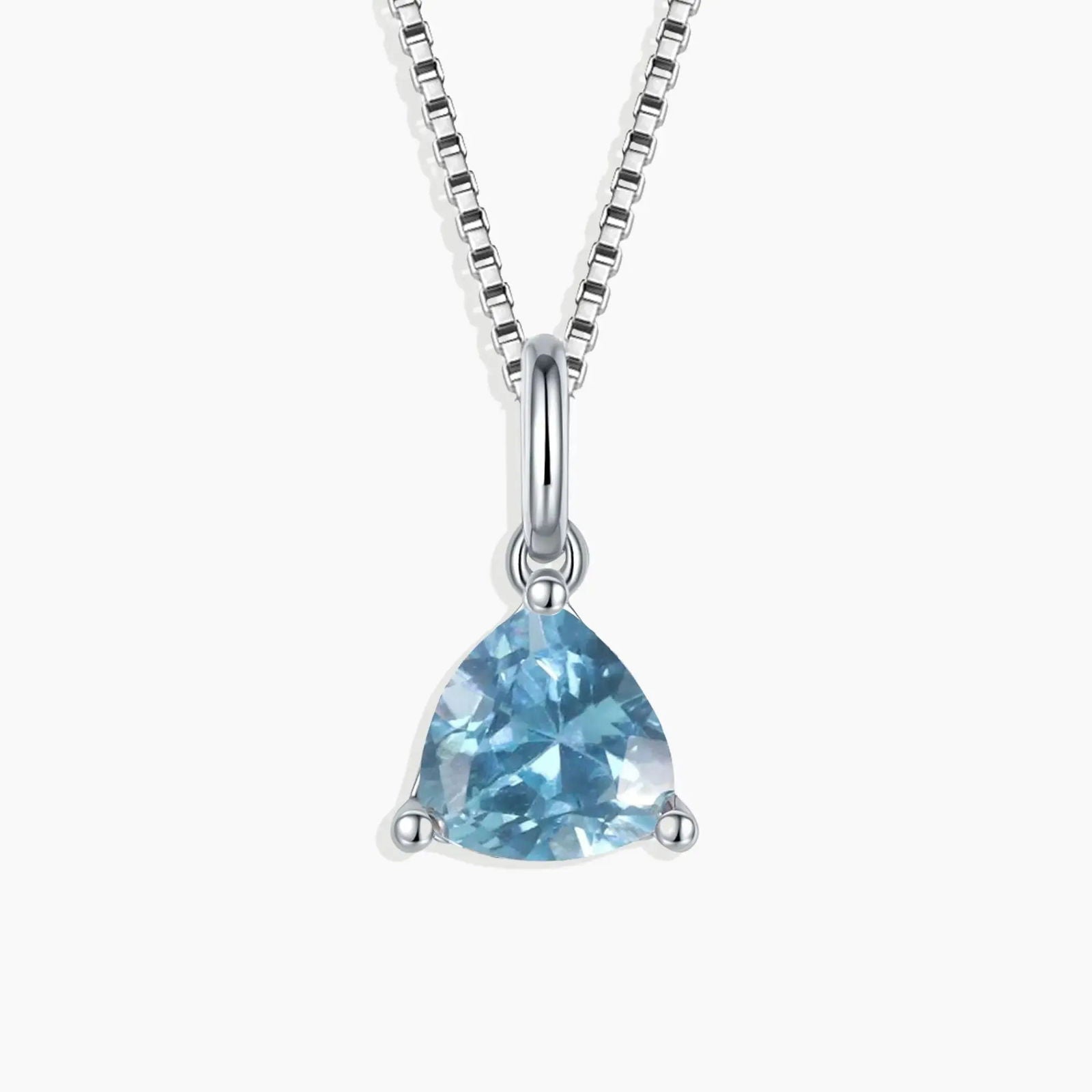 Trillion-cut aquamarine pendant in rhodium-plated sterling silver, displayed on a white background.