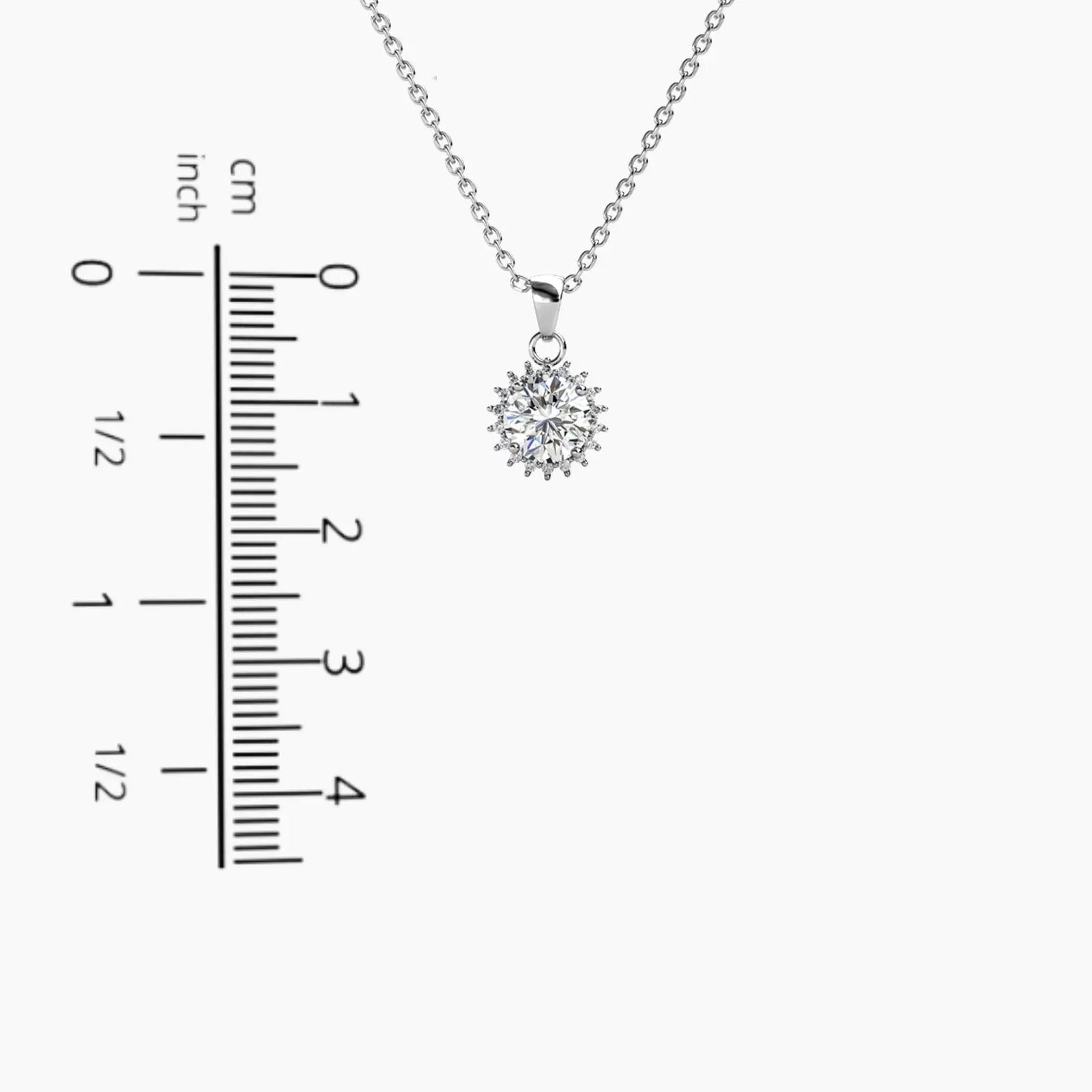Measurement chart indicating the pendant’s 1.6 cm height and 1.0 cm width for the Sunburst Moissanite Necklace.
