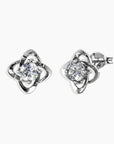 Close-up front view of the bond Stud Earrings, highlighting the round moissanite center and intricate silver setting.