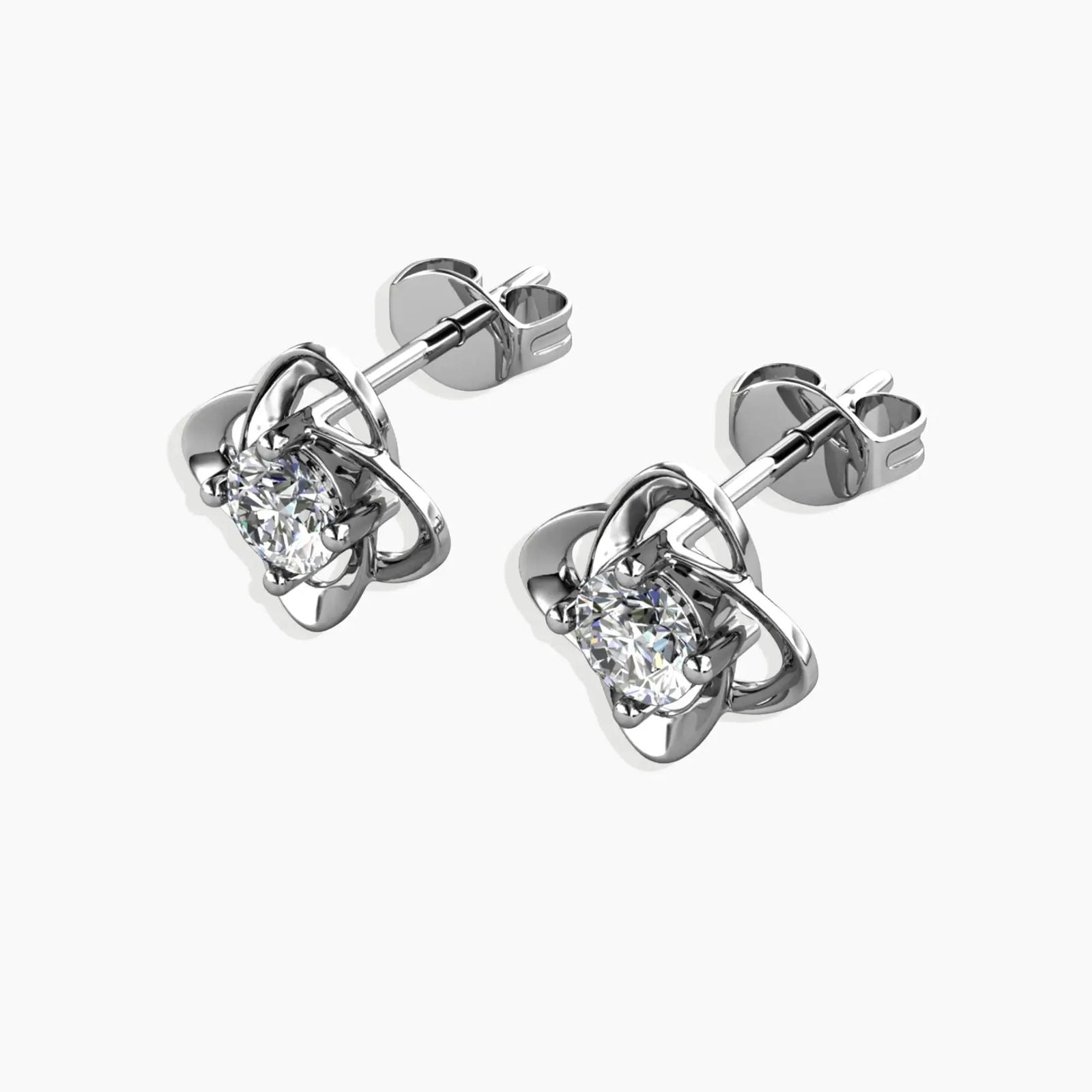 Side-angle shot of the Moissanite bond Stud Earrings, showcasing their three-dimensional design and rhodium-plated sterling silver finish.