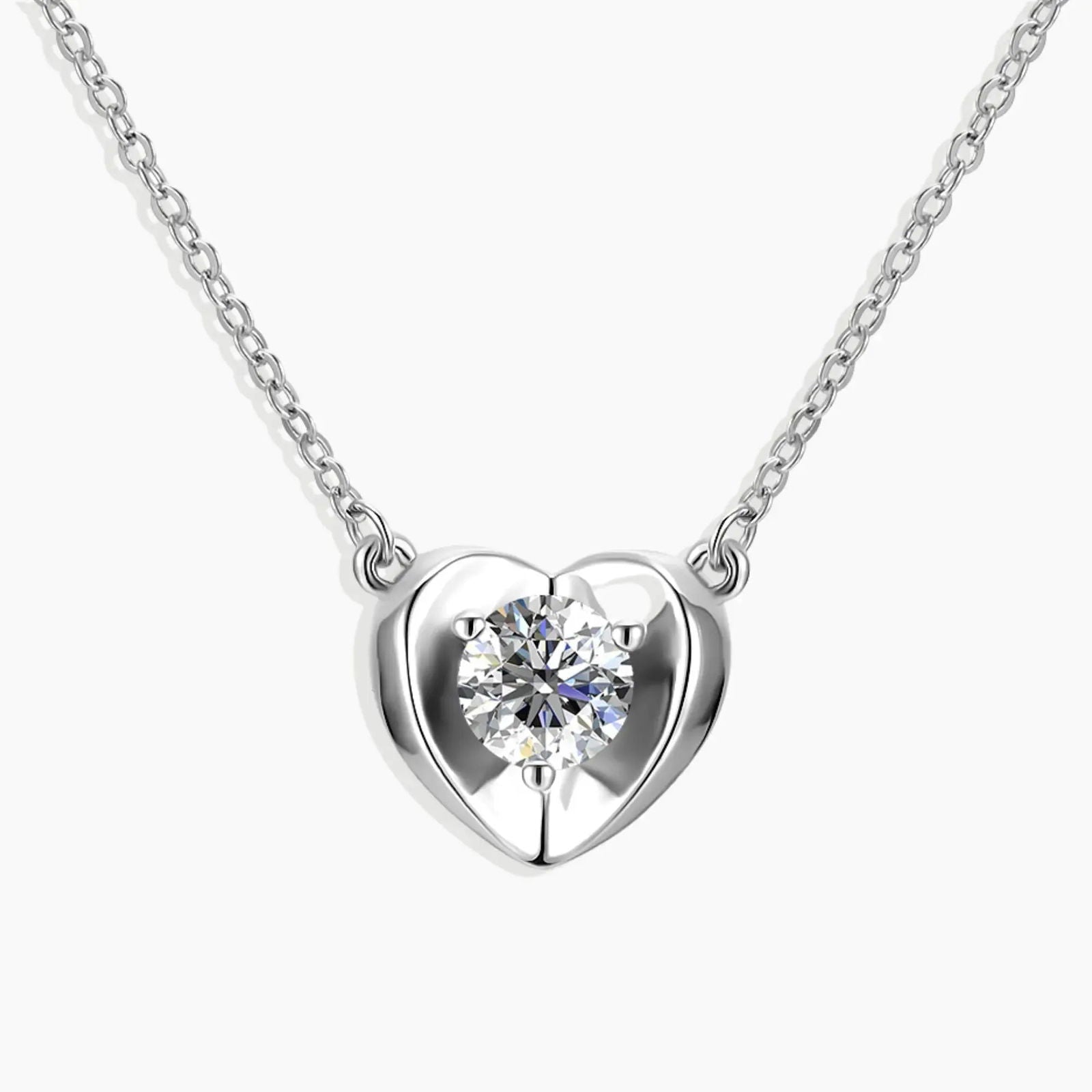 Heart-Shaped Moissanite Pendant Necklace in sterling silver, featuring a 1-carat round moissanite stone.