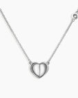 Alternate angle of the Heart Pendant Necklace, highlighting its sterling silver heart setting and moissanite sparkle.”

