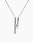 Angled close-up shot of the Moissanite Parallel Bars Pendant, showcasing the rhodium-plated finish and brilliant central gemstone.