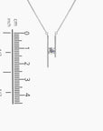 Measurement chart indicating the pendant’s 2.2 cm height and 0.9 cm width for the Moissanite Parallel Bars Necklace.
