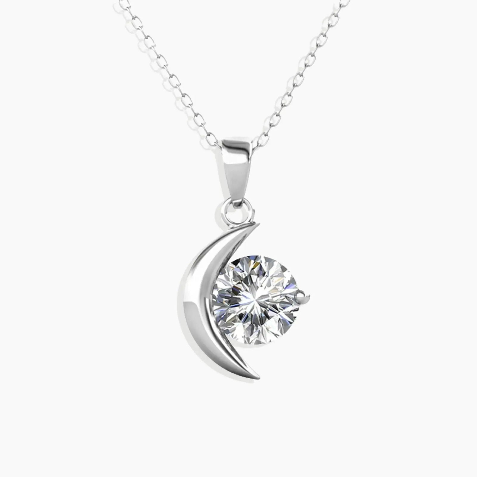 Moissanite Crescent Moon Pendant Necklace in sterling silver, featuring a 1ct round moissanite stone against a white background.