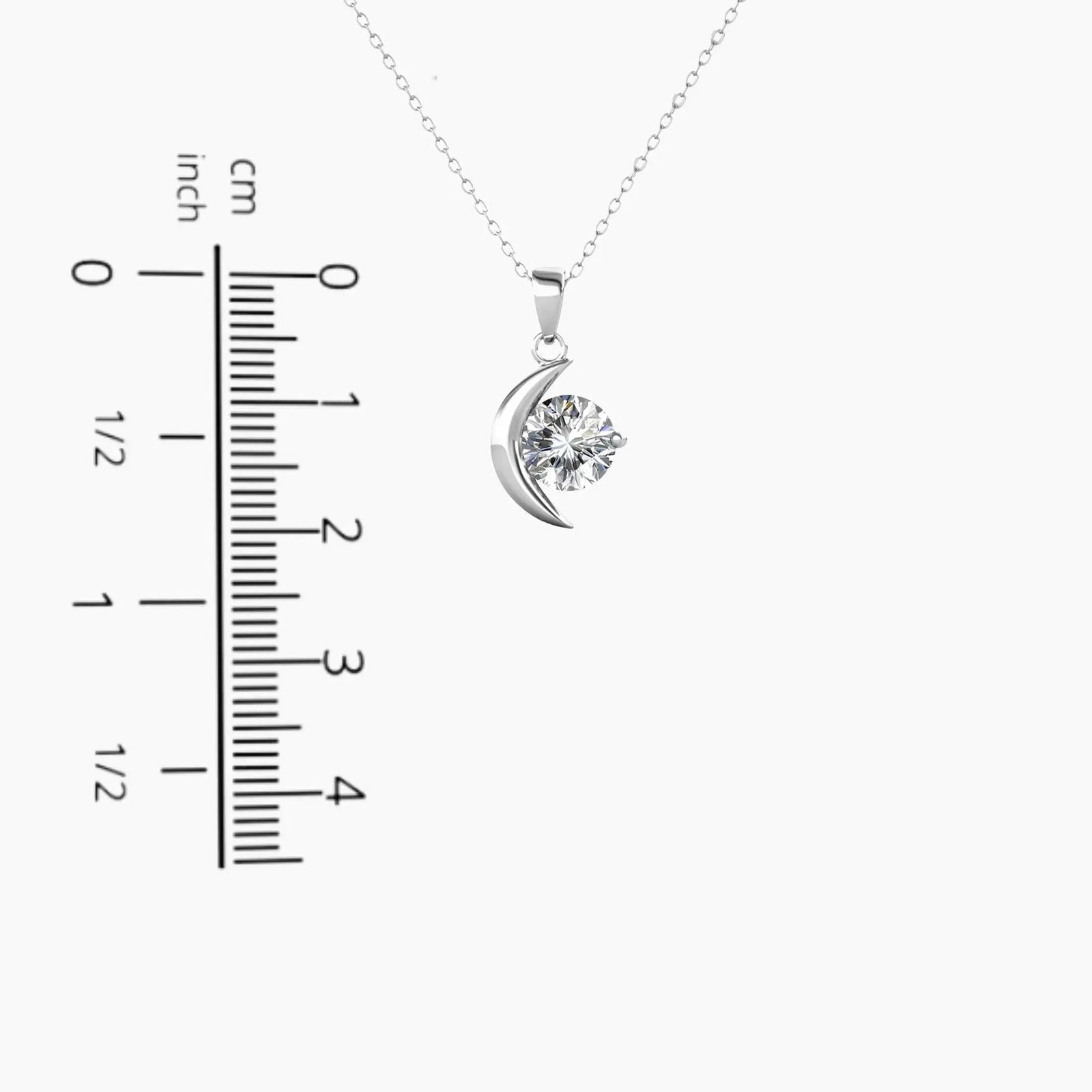 Measurement chart indicating the 2.0 cm height and 1.0 cm width of the Moissanite Crescent Moon Pendant.