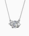 Front-facing view of the Moissanite Twin Pendant Necklace, highlighting its two round moissanite stones set in rhodium-plated sterling silver.