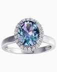 Oval-cut Alexandrite ring in rhodium-plated sterling silver with cubic zirconia halo – Irosk design