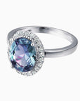 Elegant Alexandrite gemstone ring in silver showing side profile and detailed prong setting
