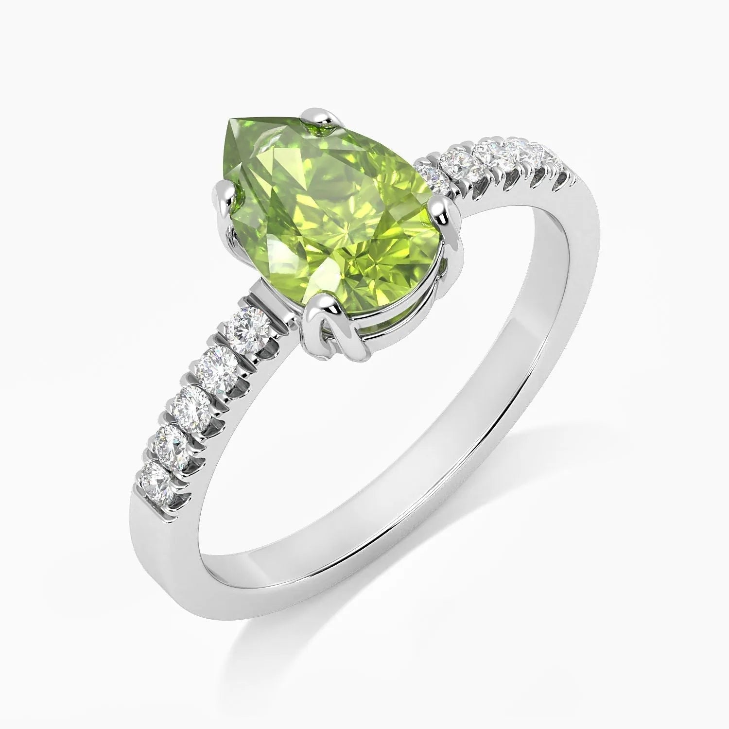 Close-up of a Sterling Silver Pear Cut Peridot Ring, showcasing its natural peridot stone and four-claw setting.