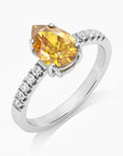side view of pear shaped citrine ring in silver