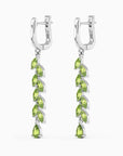 front and side view of peridot green drop earrings