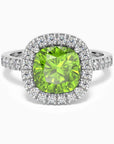 Cushion Cut Peridot Halo Ring in Sterling Silver, featuring a natural peridot gemstone with halo diamond alternatives surrounding the centerpiece.