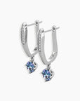Alexandrite dangle earrings with colour-changing gemstone in rhodium-plated elongated setting