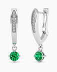 Sterling silver hoop earrings with a round emerald drop, displayed on a white background.