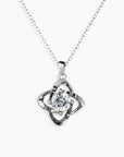 Moissanite Bond Pendant Necklace in sterling silver, featuring a 6.5 mm round moissanite center stone, displayed on a white background.