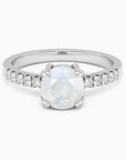 Round moonstone engagement-style ring with cubic zirconia halo shank in rhodium-plated sterling silver – Irosk Australia