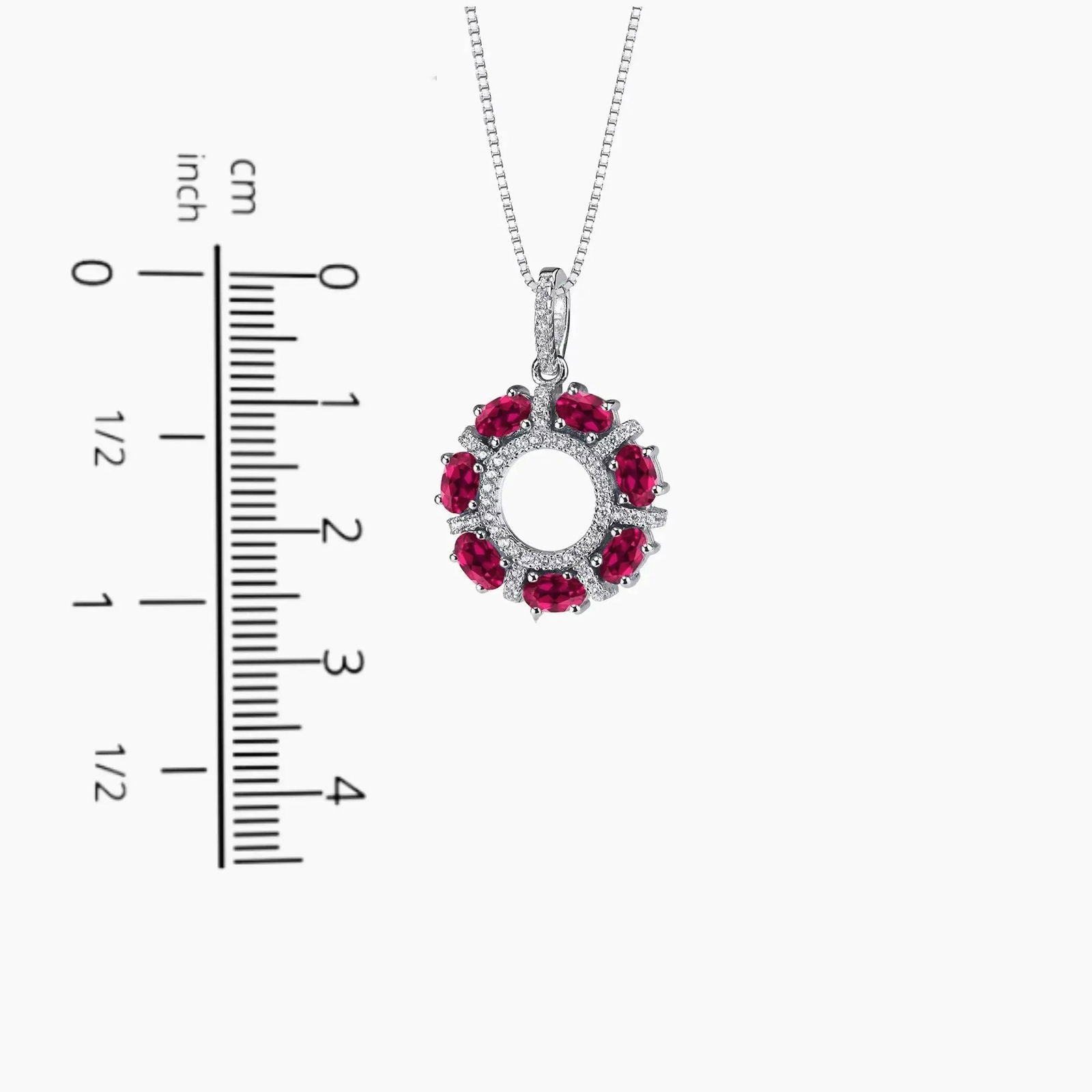 ruby celestial necklace on scale
