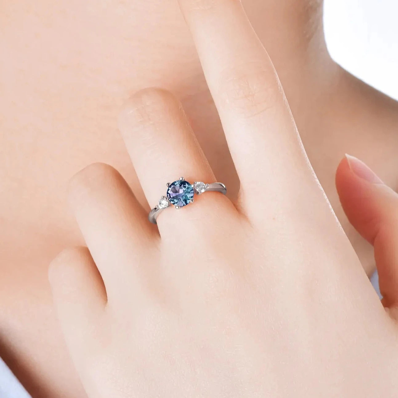 photo displaying alexandrite ring on a model