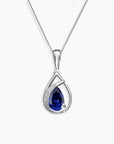 Sapphire teardrop necklace in sterling silver with a deep blue gemstone, featuring an elegant intertwined design for a sophisticated look.