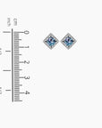 Alexandrite framed stud earrings next to ruler – 1.2 cm by 1.2 cm with 8 mm gemstone