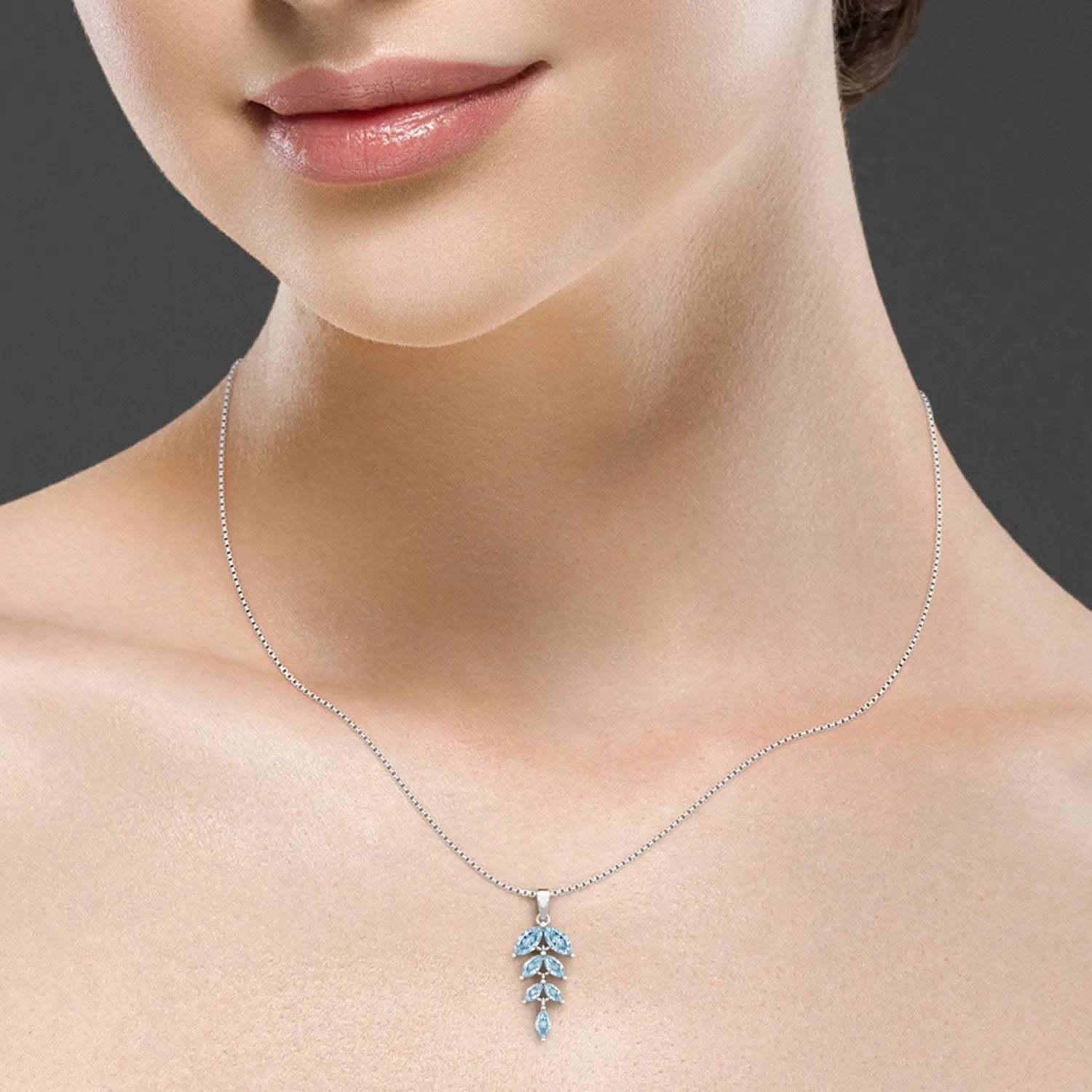 Sparkling Topaz Leaf Pendant: A Touch of Timeless Elegance - Irosk Australia