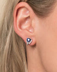 Close-Up of Rhodium-Plated Sterling Silver Blue Sapphire Heart Earrings