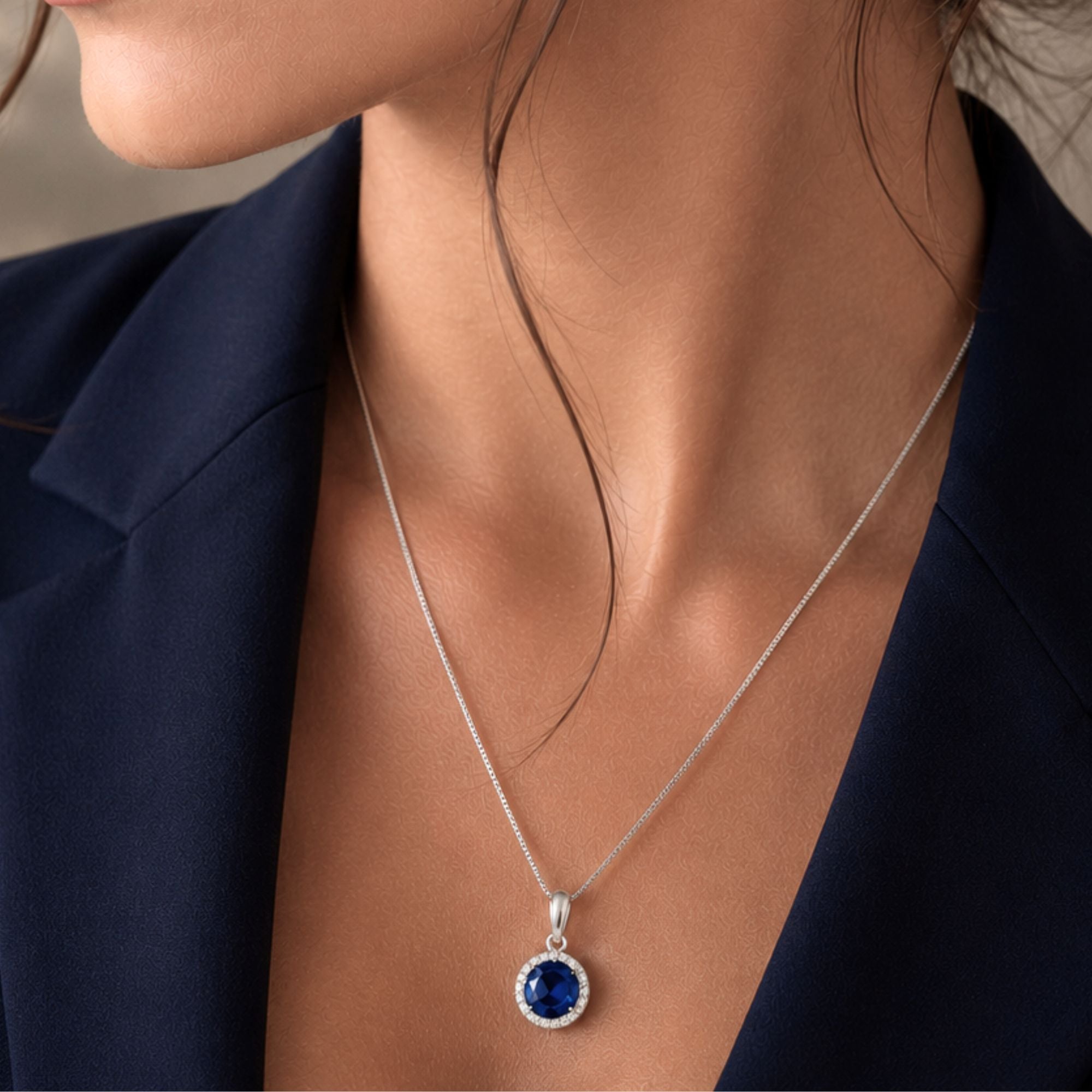 sapphire round halo pendant in sterling silver
