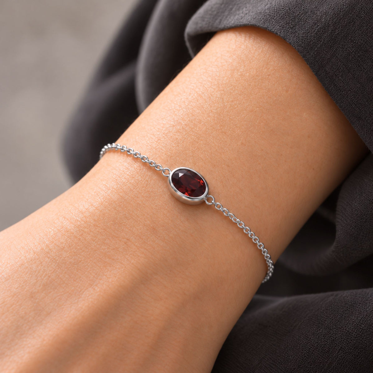 Garnet Oval Solitaire Bracelet in Sterling Silver – January Birthstone | Irosk