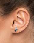 blue sapphire cluster earrings on model