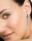 blue gemstone drop earrings on model