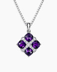 Regal Amethyst Cluster Pendant featuring four square-cut natural amethysts set in rhodium-plated sterling silver on a 45 cm box chain.