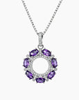 Luxury sterling silver halo pendant featuring seven oval-cut natural amethysts in a circular setting, paired with a fine box chain.