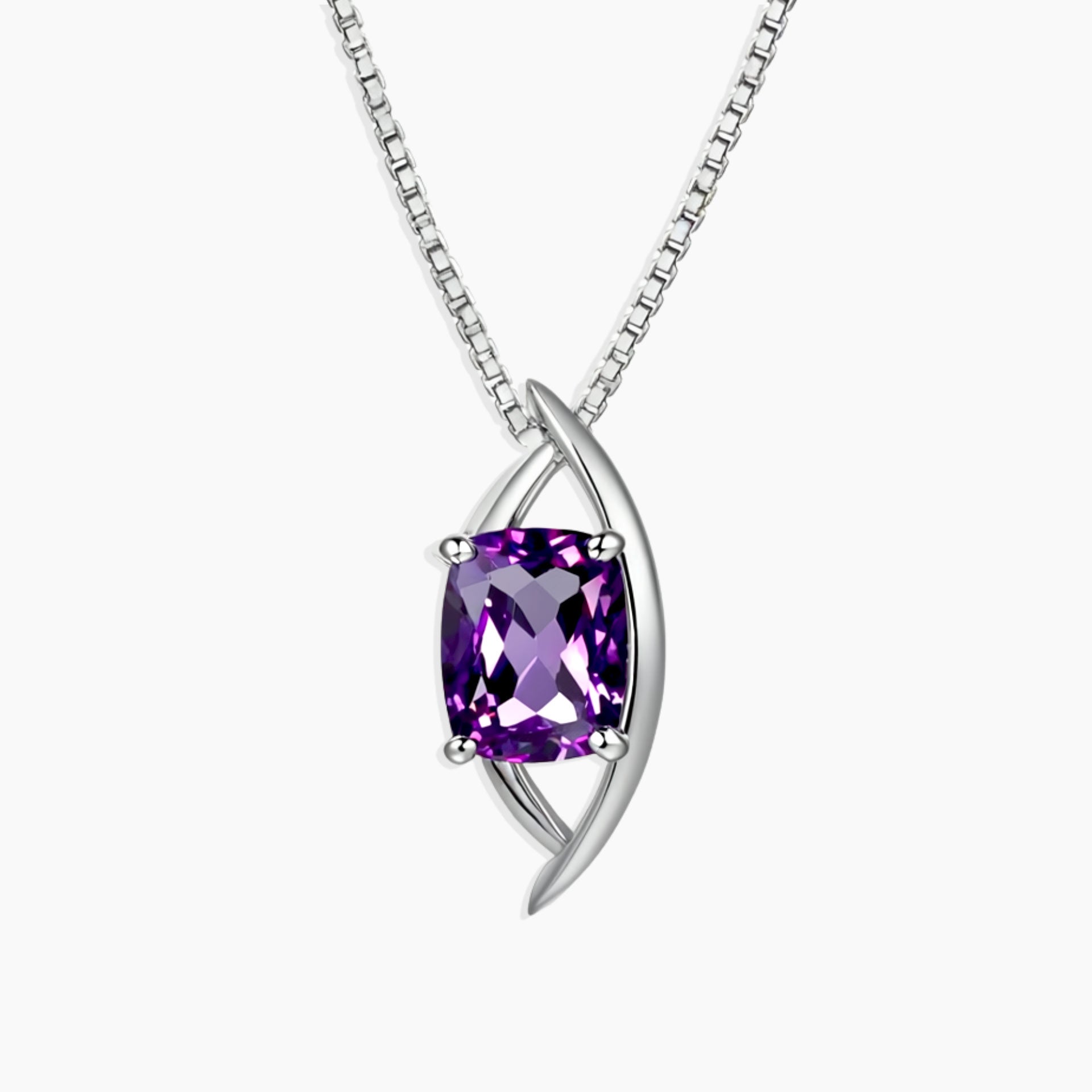 Luxury sterling silver pendant necklace featuring a cushion-cut deep amethyst set in an artistic globe-style frame on a box chain.