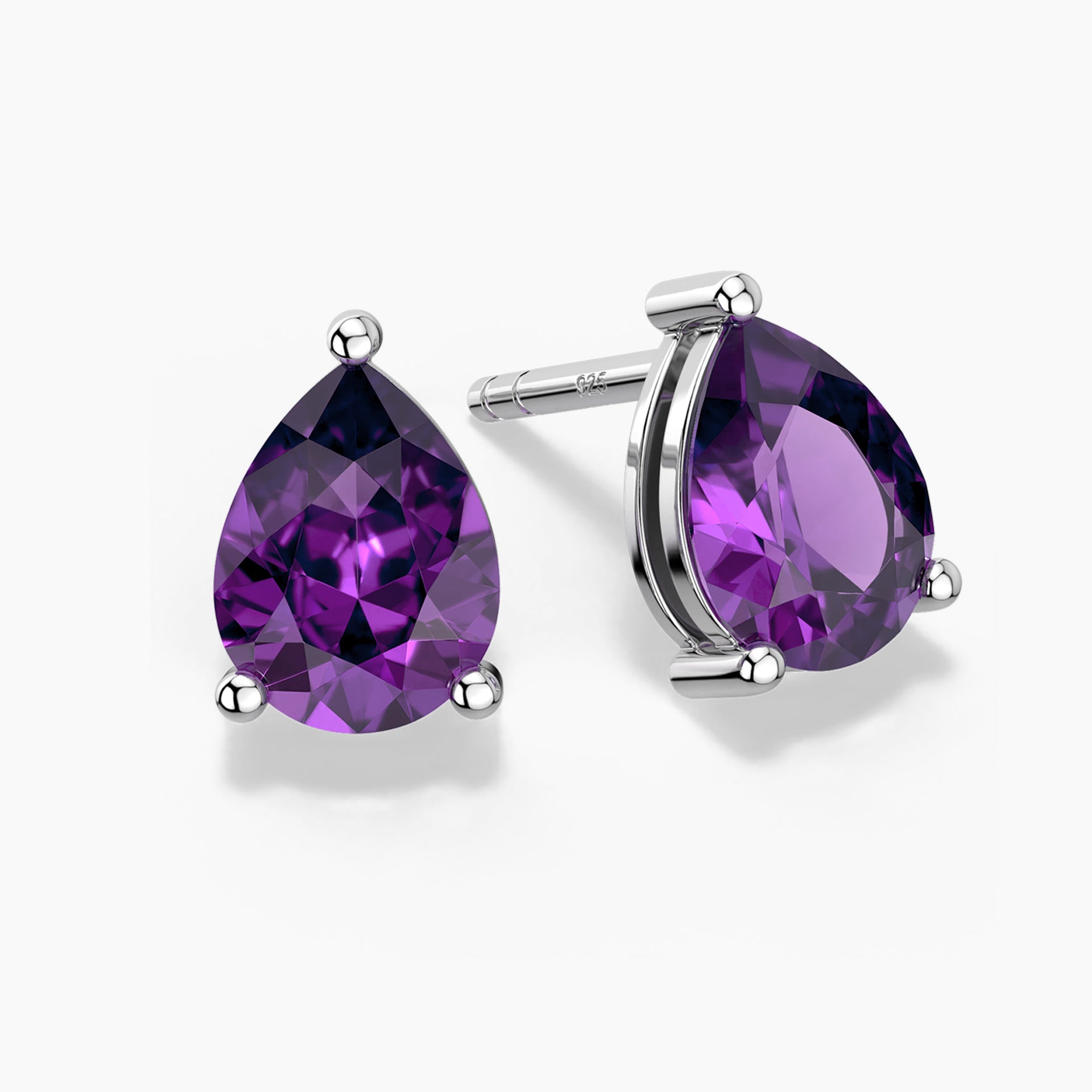 Teardrop-shaped amethyst stud earrings in silver claw setting