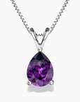 Pear-shaped amethyst pendant necklace in silver claw setting on a box chain