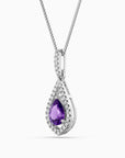 Teardrop-shaped purple gemstone pendant on a chain against a white background