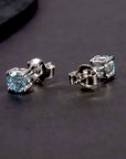 aquamarine silver earrings in round shape 