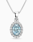 Oval Aquamarine Halo Pendant Necklace – Sterling Silver Birthstone Jewellery | Irosk